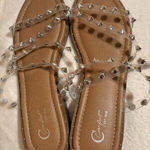 Fun women sandals with jelly straps and silver accents size 10.